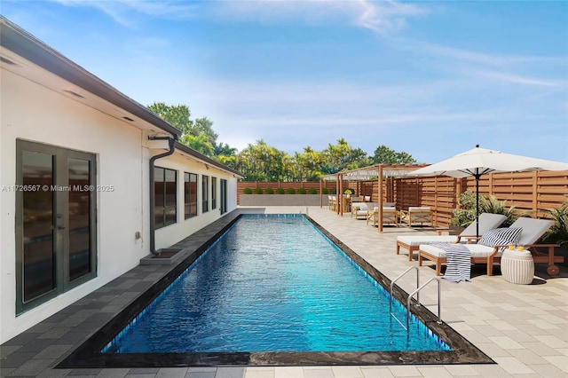 view of pool featuring an outdoor hangout area, a pergola, and a patio