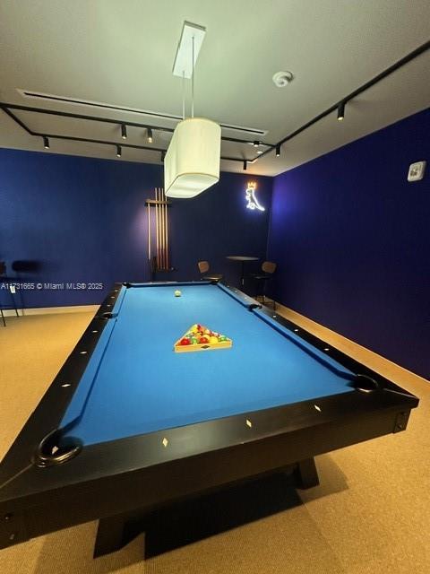 rec room featuring carpet flooring