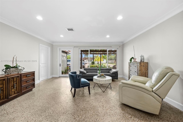 living room with ornamental molding