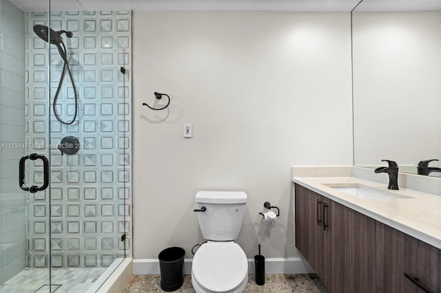 bathroom featuring walk in shower, vanity, and toilet