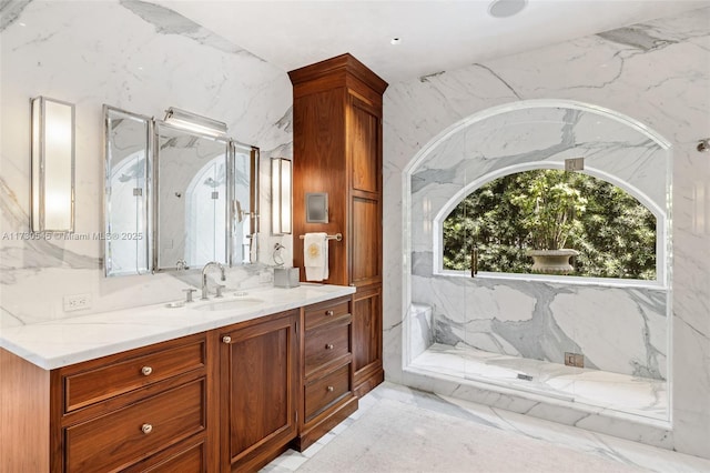 bathroom featuring vanity and walk in shower