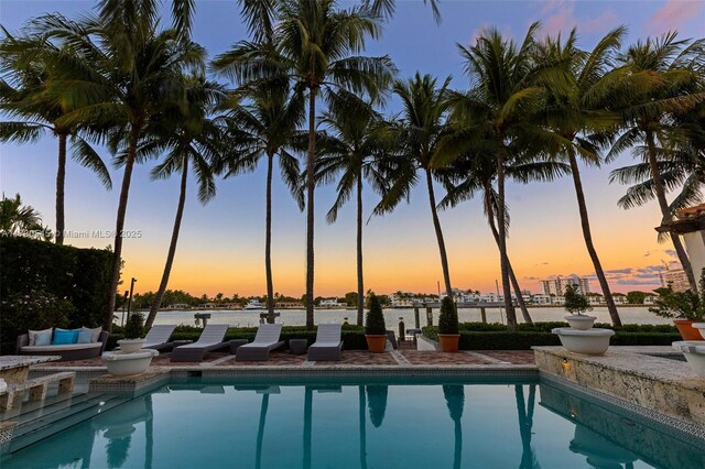 view of pool featuring a patio and pool water feature