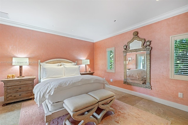 bedroom with crown molding