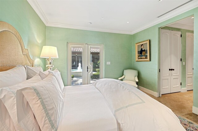 bedroom featuring crown molding, access to outside, and french doors