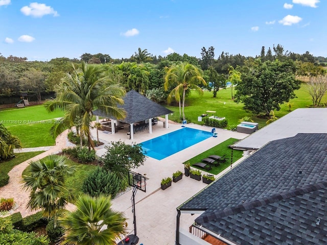 view of pool featuring a gazebo, a lawn, and a patio