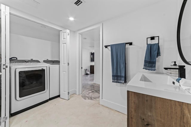 washroom featuring independent washer and dryer