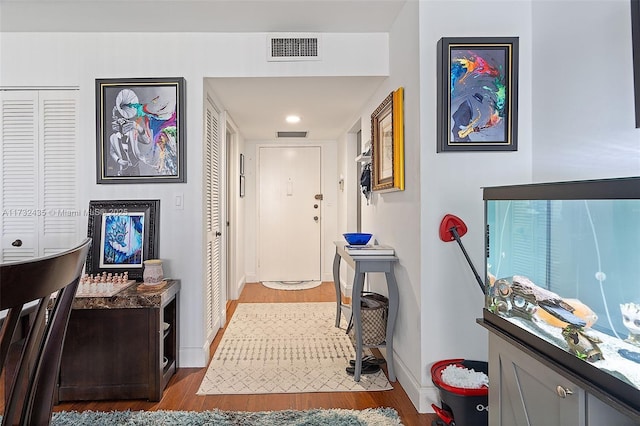 hallway featuring light wood-type flooring