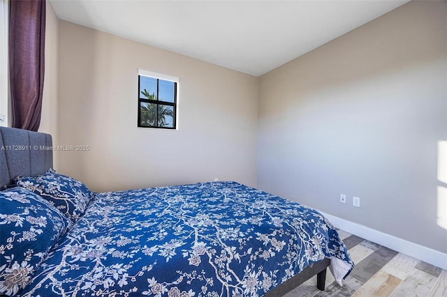 bedroom featuring hardwood / wood-style floors