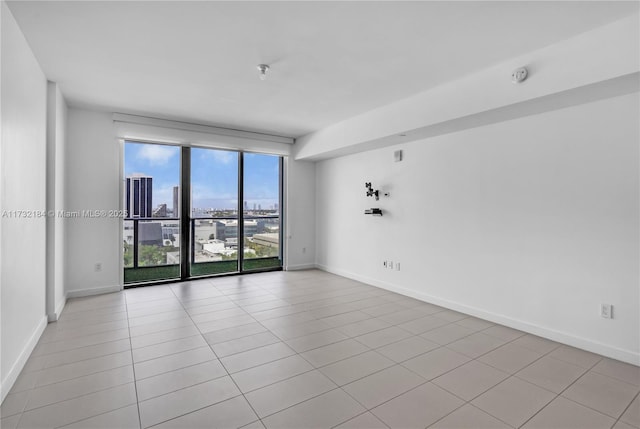 view of tiled spare room