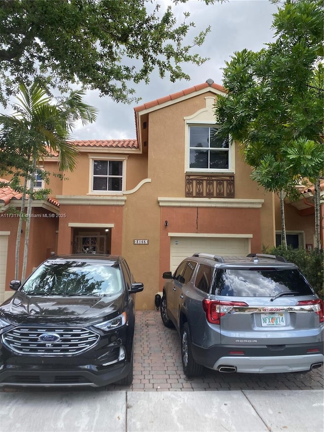 view of front of property featuring a garage