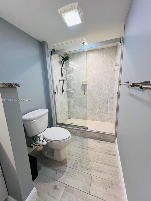 2301 S Ocean Dr Unit 2408, Hollywood, FL 33019 - bathroom featuring a shower stall and toilet