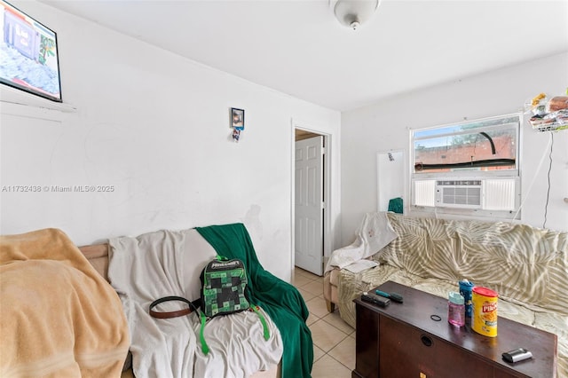 bedroom with light tile patterned flooring and cooling unit