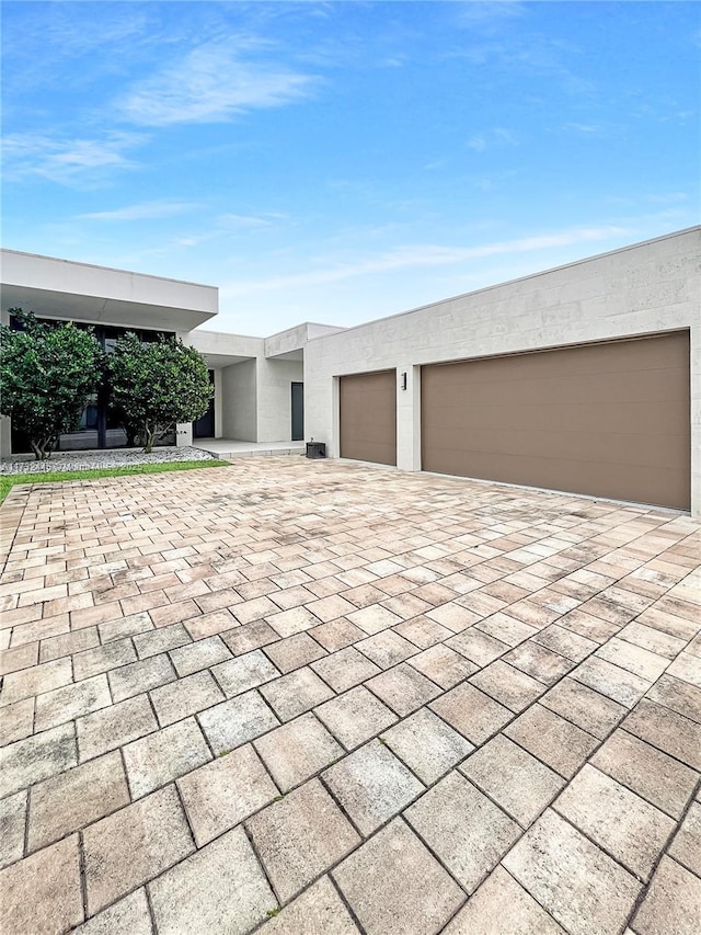 exterior space with a garage