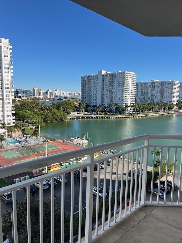 balcony featuring a water view