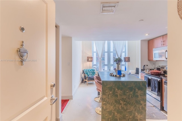 kitchen with stainless steel electric range oven