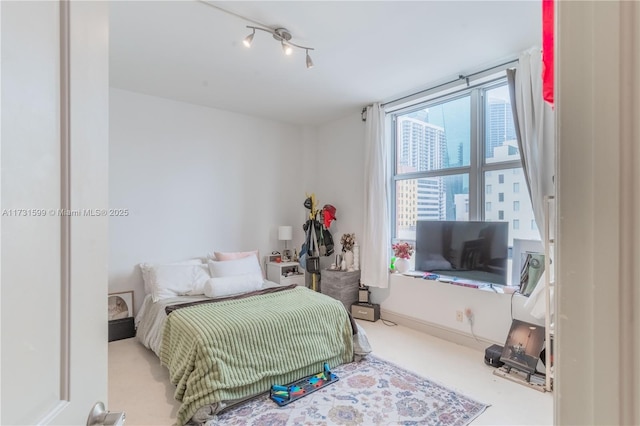 bedroom with track lighting