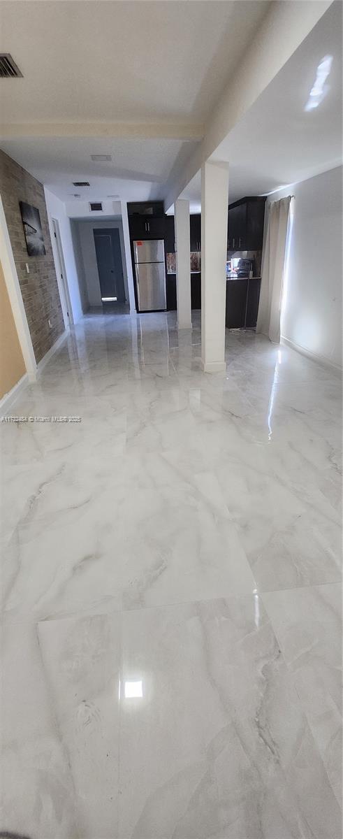 living room with concrete floors