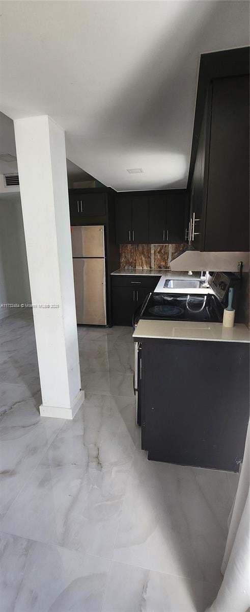 kitchen with stainless steel fridge