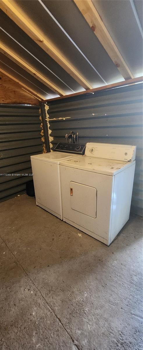 laundry room with washer and clothes dryer