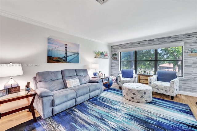 living room featuring ornamental molding and dark wood-type flooring