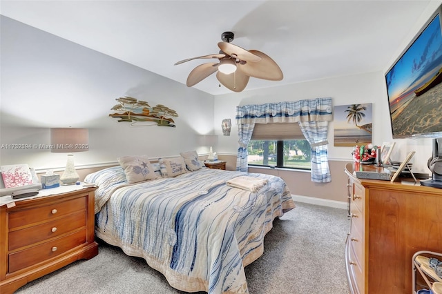 bedroom with light colored carpet and ceiling fan