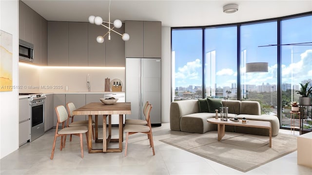 interior space featuring expansive windows, sink, and a notable chandelier