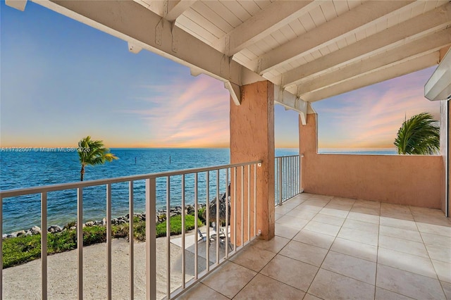 balcony at dusk with a water view