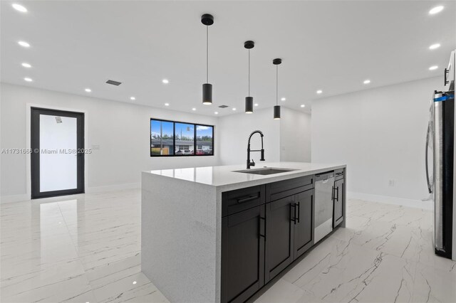 2814 SW 92nd Ct, Miami, FL 33165 - kitchen with sink, light stone counters, decorative light fixtures, a center island with sink, and stainless steel appliances