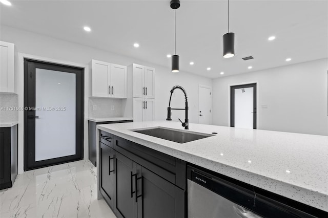 2814 SW 92nd Ct, Miami, FL 33165 - kitchen with white cabinetry, dishwasher, sink, hanging light fixtures, and light stone counters