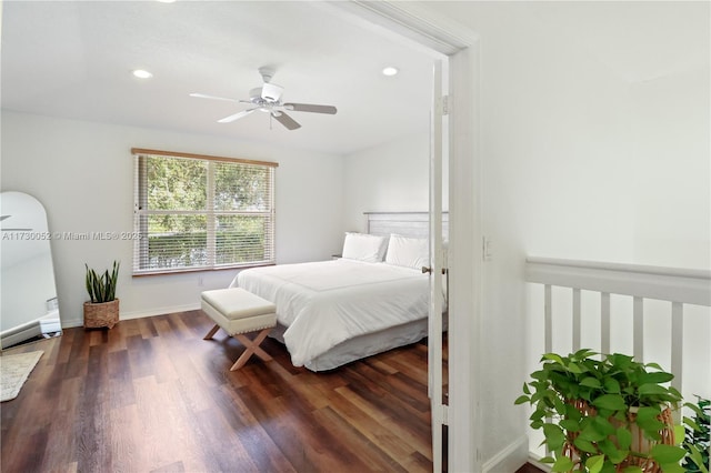 bedroom with dark hardwood / wood-style floors and ceiling fan