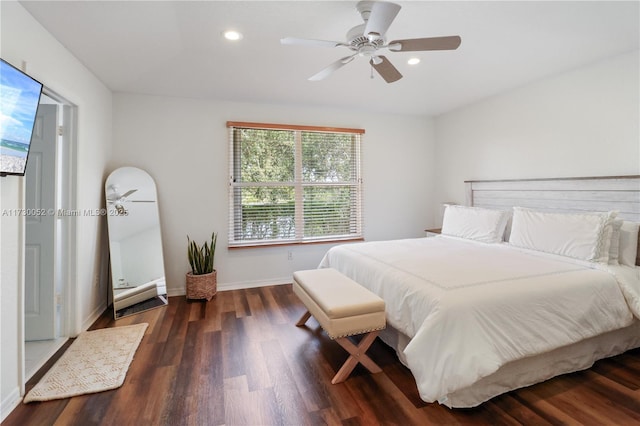 bedroom with dark wood-type flooring and ceiling fan