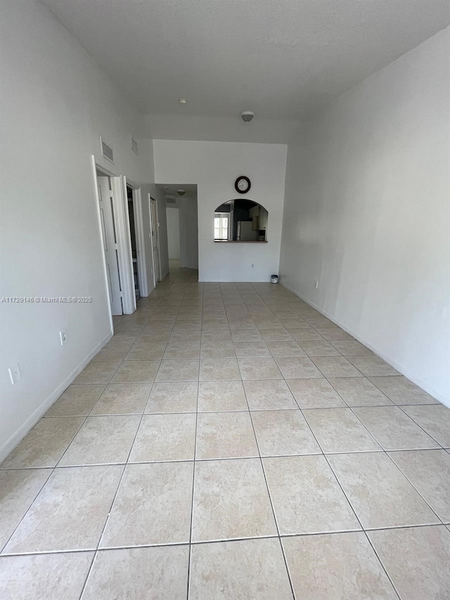 2921 SE 13th Rd Unit 205-39, Homestead, FL 33035 - unfurnished living room with light tile patterned floors