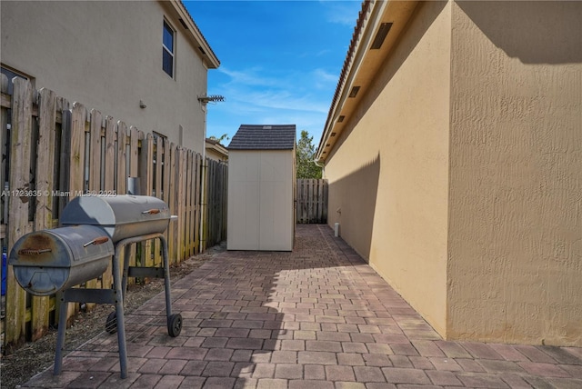 view of patio with a grill