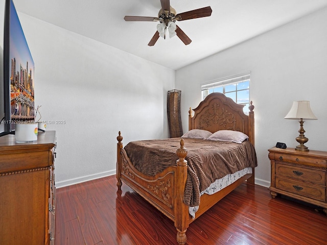 bedroom featuring dark wood-type flooring and ceiling fan