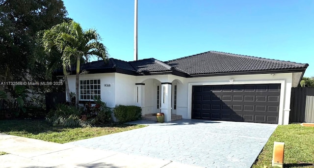 view of front of home with a garage