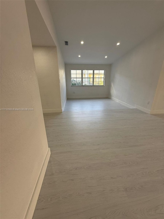 empty room with light wood-type flooring