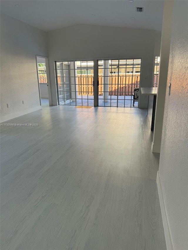 unfurnished room featuring hardwood / wood-style floors