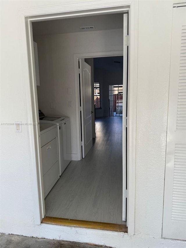 laundry area featuring independent washer and dryer