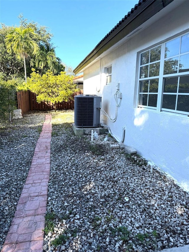 view of home's exterior featuring central air condition unit