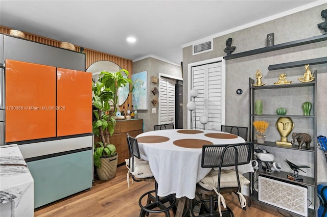 dining area featuring hardwood / wood-style floors