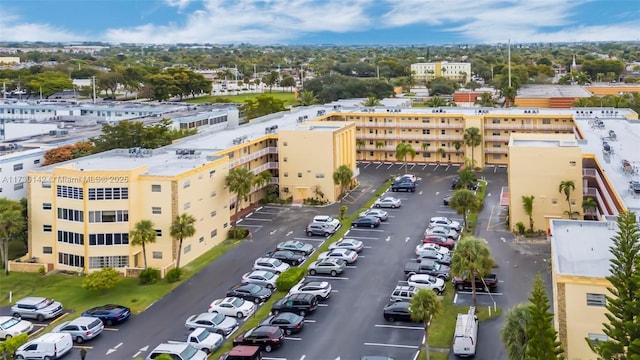 birds eye view of property featuring a city view