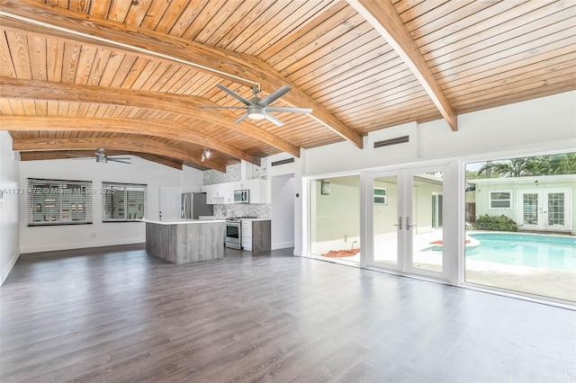 unfurnished living room featuring ceiling fan, french doors, and wooden ceiling