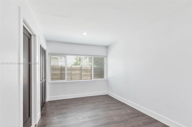 bedroom featuring hardwood / wood-style floors