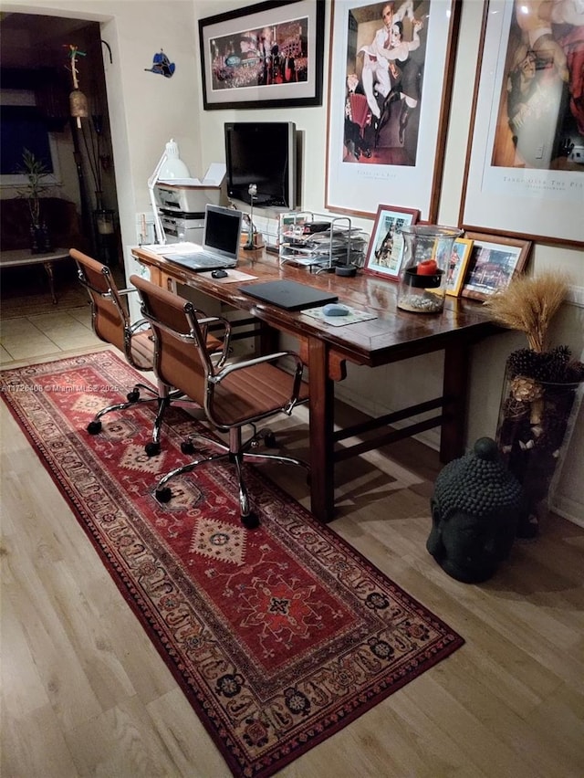 office area with hardwood / wood-style flooring