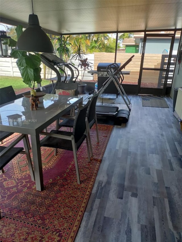 unfurnished sunroom featuring a healthy amount of sunlight