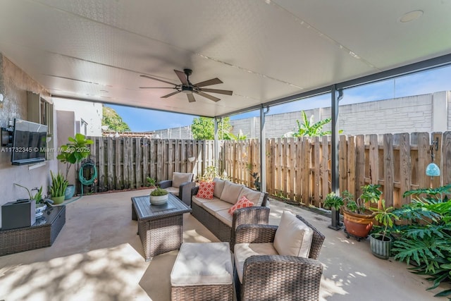 view of patio / terrace featuring ceiling fan and an outdoor living space