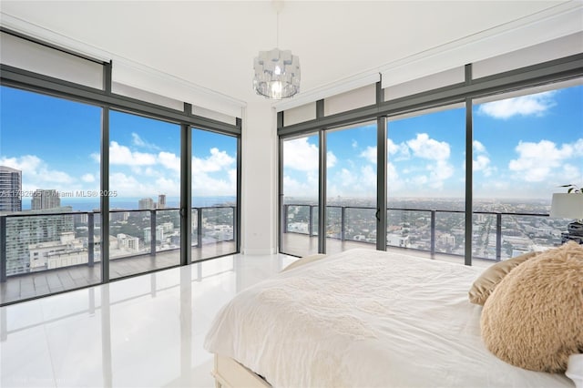 tiled bedroom with an inviting chandelier, floor to ceiling windows, and multiple windows