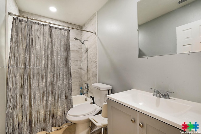 full bathroom with vanity, shower / bath combination with curtain, and toilet