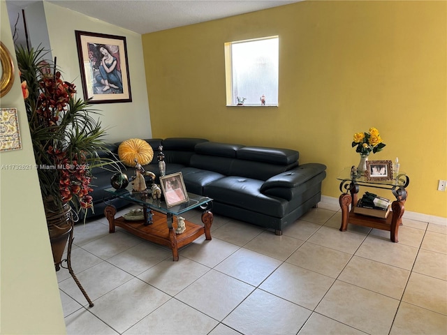 tiled living room with lofted ceiling