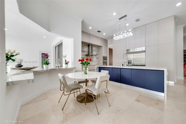 dining space with sink